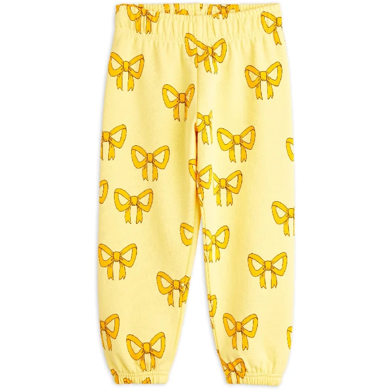 sports pant for winter sports -Mini Rodini Yellow Bow Aop Sweatpants